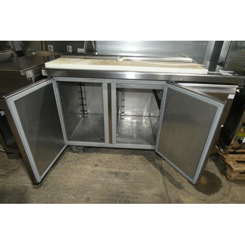 1152 - A 3 door salad/pizza prep bench fridge with sliding chopping board & lift top by Caravell - trade. T... 