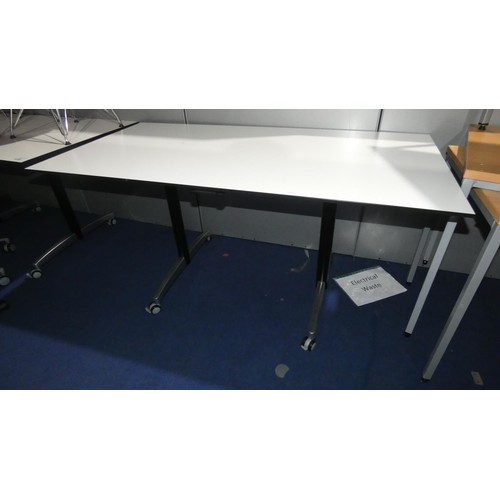 1258 - 1 office table on wheels with a light grey tipping top approx 150 x 75cm