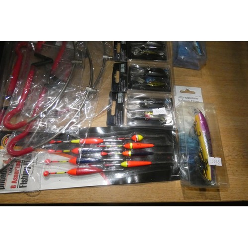 2023 - A quantity of various fishing related items including an Olympic Spark 1800VO reel, floats, lures et... 