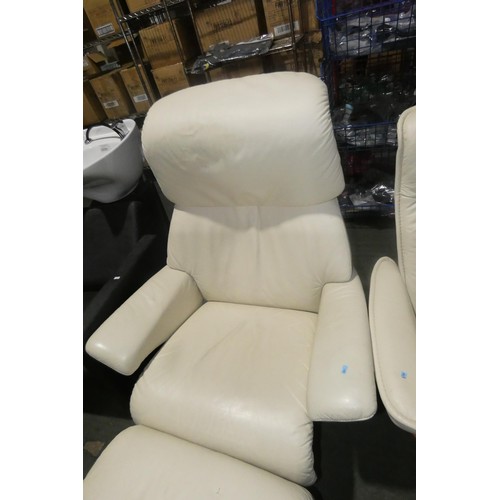 2230 - 1 Stressless cream upholstered swivelling reclining arm chair with matching footstool.
Height 111cm ... 