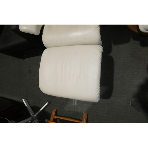 2230 - 1 Stressless cream upholstered swivelling reclining arm chair with matching footstool.
Height 111cm ... 