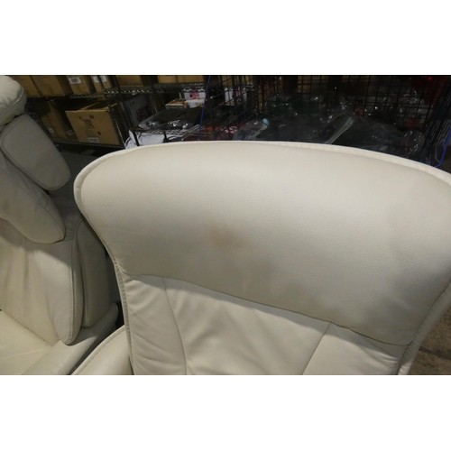 2231 - 1 Stressless cream upholstered swivelling reclining arm chair with matching footstool.
Height 95cm  ... 