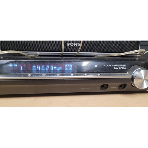 2459 - A Sony DVD home theatre system/surround sound HD system with L & R front, L & R rear & centre speake... 