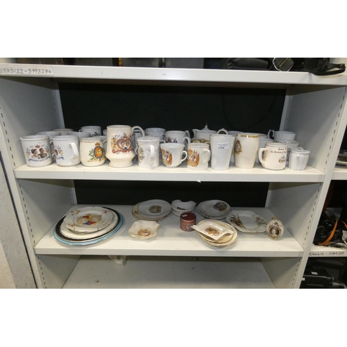 3109 - A large quantity of miscellaneous decorative royal commemorative beakers and plates etc (2 shelves)