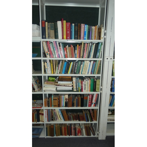 3124 - A large quantity of miscellaneous hardback and paperback general books (7 shelves)