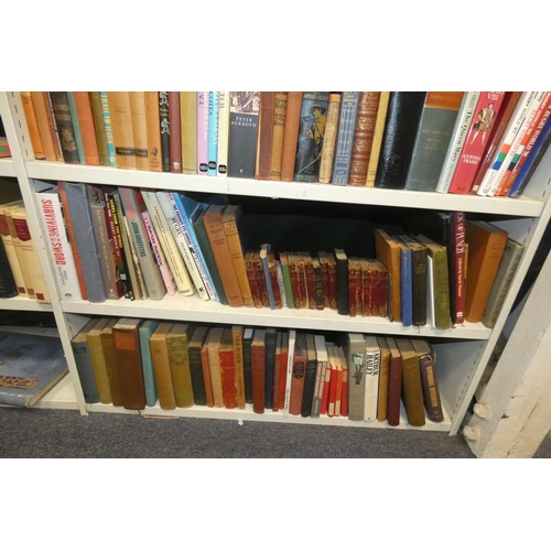 3124 - A large quantity of miscellaneous hardback and paperback general books (7 shelves)