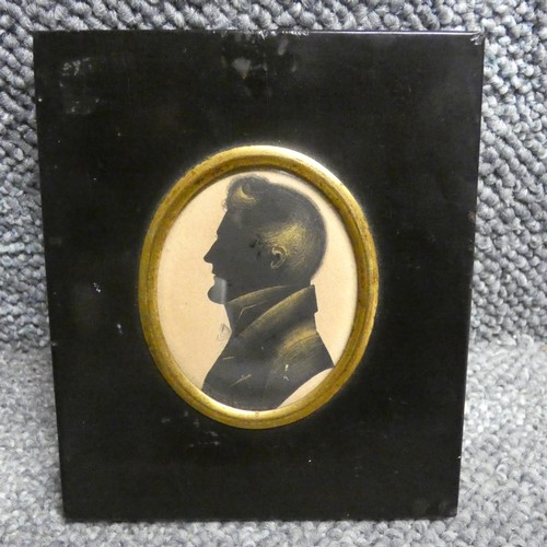 3013 - English School 19th Century, Silhouette portrait miniature of a gentleman,  gilded highlights, oval,... 