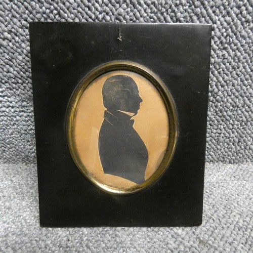 3023 - P. Skeolan, Silhouette of a gentleman, cut out, oval, stamped to reverse, 9x7.4cm. Faded.