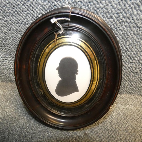 3027 - John Miers (1758-1812), a Silhoutte on plaster of an elderly gentleman, domed glass with gilt revers... 