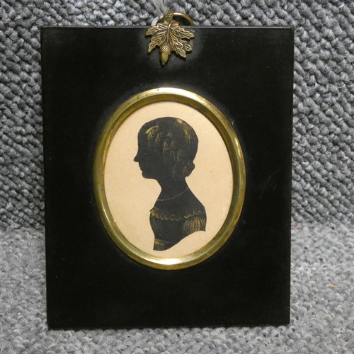 3014 - William Seville (British, fl.c.1818-1845), Silhouette portrait miniature of a young girl, cut and hi... 