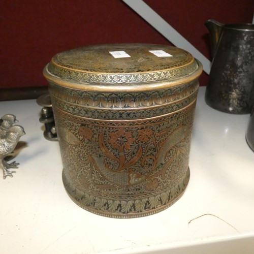 3092 - A large copper samovar with brass tap, a stained glass leaded panel, a large oriental embossed brass... 