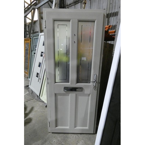 6 - An Evolution PVC external door in frame, colour is French grey outside / light green inside, 1 x key... 