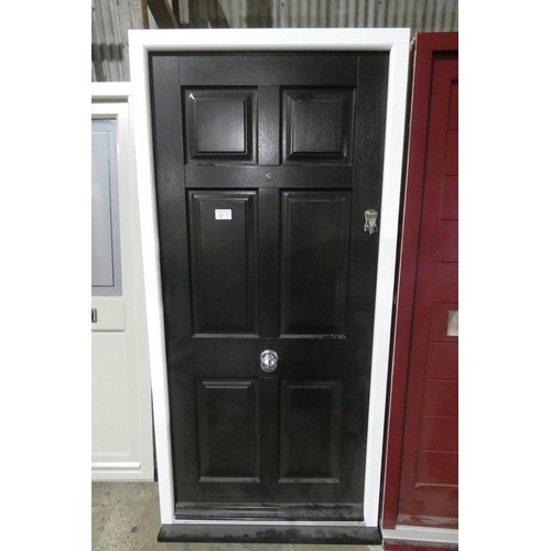 7 - An engineered hardwood external door in frame, colour is black door / white frame both sides, 3 x ke... 