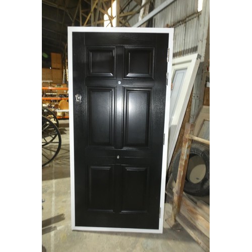 7 - An engineered hardwood external door in frame, colour is black door / white frame both sides, 3 x ke... 