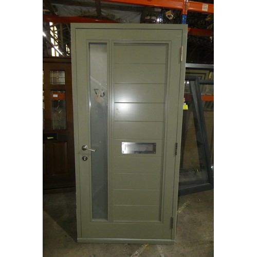 8 - An engineered Redwood timber external door in frame, colour is maroon outside / light green inside, ... 