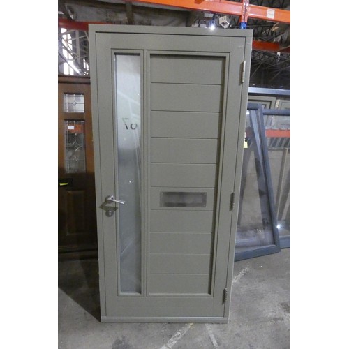 8 - An engineered Redwood timber external door in frame, colour is maroon outside / light green inside, ... 