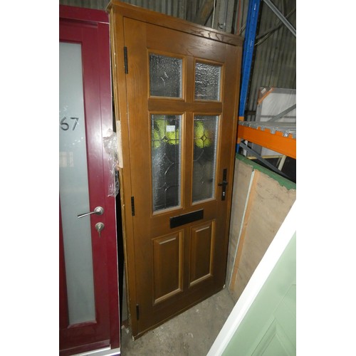 9 - An engineered Oak external door in frame, colour is dark stain on both sides, no key included, overa... 