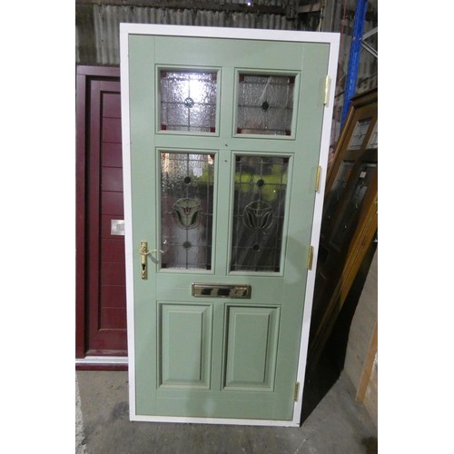 10 - An engineered hardwood triple glazed external door in frame, colour is green door / white frame both... 