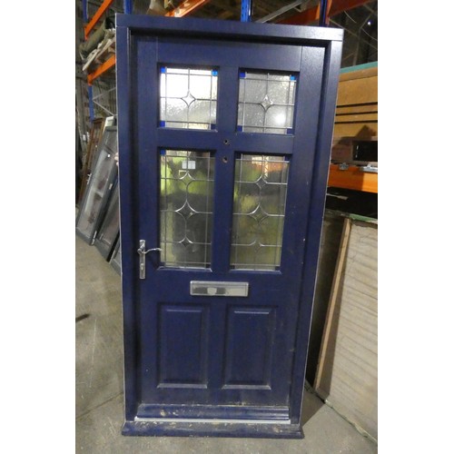 12 - An engineered hardwood external door in frame, colour is dark blue on both sides, 3 x keys are inclu... 