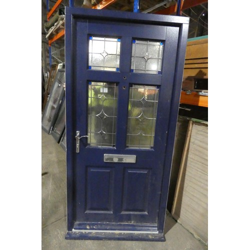 12 - An engineered hardwood external door in frame, colour is dark blue on both sides, 3 x keys are inclu... 