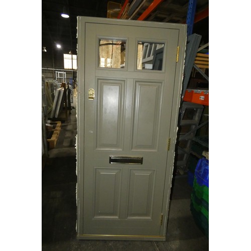 26 - An engineered hardwood external door in frame, colour is Oxford Clay RAL7002 on both sides, 3 x keys... 