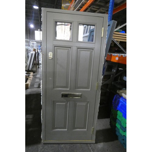 26 - An engineered hardwood external door in frame, colour is Oxford Clay RAL7002 on both sides, 3 x keys... 