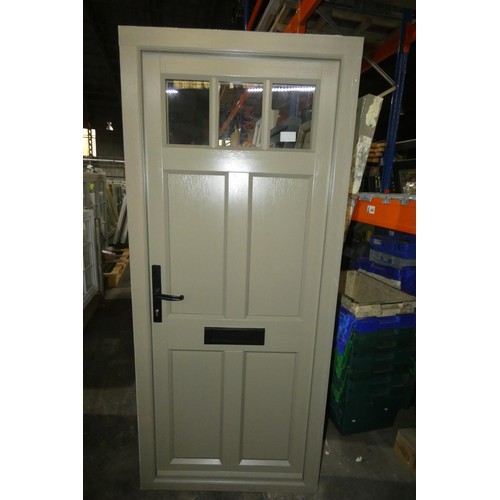 27 - An Evolution PVC  external door in frame, colour is Oxford Clay RAL7002 on both sides, no key includ... 