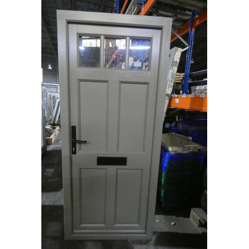 27 - An Evolution PVC  external door in frame, colour is Oxford Clay RAL7002 on both sides, no key includ... 