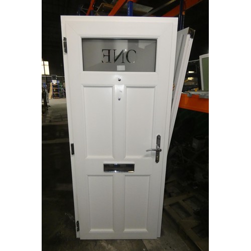 30 - An Evolution PVC  external door in frame, colour is black outside / white inside , 2 x keys are incl... 