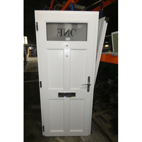 30 - An Evolution PVC  external door in frame, colour is black outside / white inside , 2 x keys are incl... 