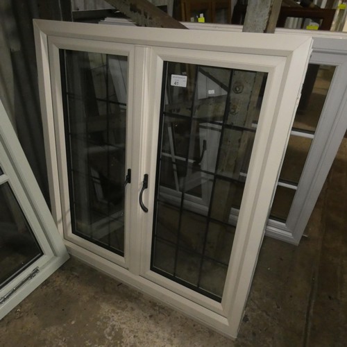 41 - A PVC double glazed casement window, colour is cream on both sides, overall size of frame is approx ... 