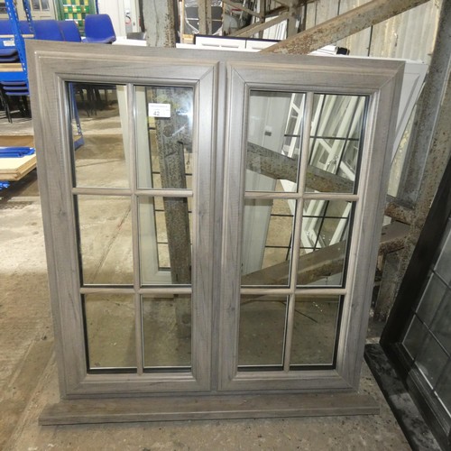 42 - A PVC double glazed casement window, colour is silver Oak outside / white inside , overall size of f... 