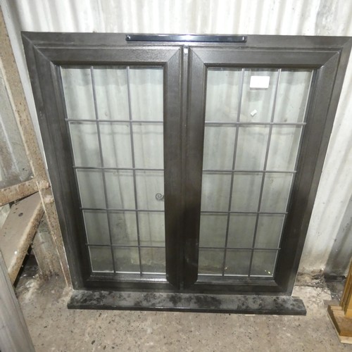 43 - A PVC double glazed casement window, colour is black outside / white inside , overall size of frame ... 