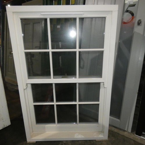 58 - An engineered Redwood timber double glazed spiral balanced box sash window, colour is white on both ... 