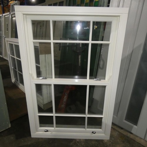 59 - An engineered Redwood timber double glazed spiral balanced box sash window with built in protruding ... 