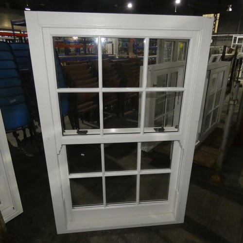 61 - A PVCu double glazed sash window, colour is white on both sides, overall size of frame is approx 100... 