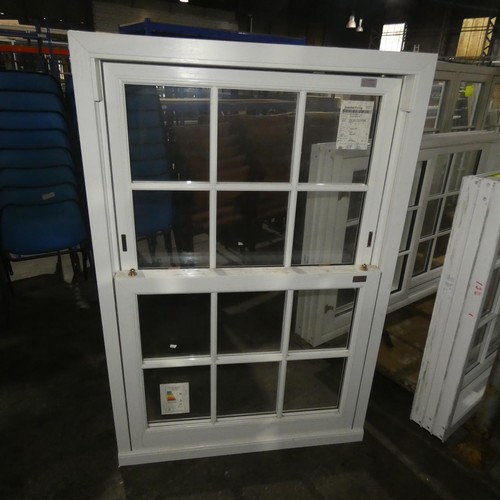 62 - A PVCu double glazed sash window, colour is white on both sides, overall size of frame is approx 100... 