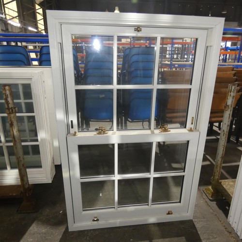 63 - A PVCu double glazed sash window, colour is white on both sides, overall size of frame is approx 100... 