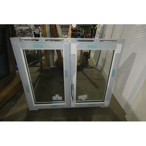 69 - An Evolution PVC double glazed casement window, colour is white both sides, overall size of frame is... 