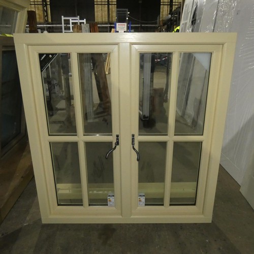 70 - An Evolution Storm PVC double glazed casement window, colour is cream both sides, overall size of fr... 