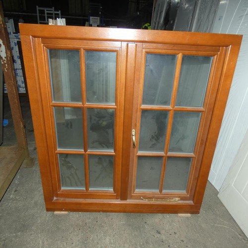 71 - An engineered hardwood double glazed casement window, colour is rustic Oak stain on both sides, over... 