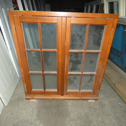 71 - An engineered hardwood double glazed casement window, colour is rustic Oak stain on both sides, over... 