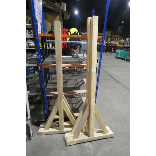 74 - 4 wooden stands - two are approx 175cm high and two are approx 165cm high (previously used to displa... 