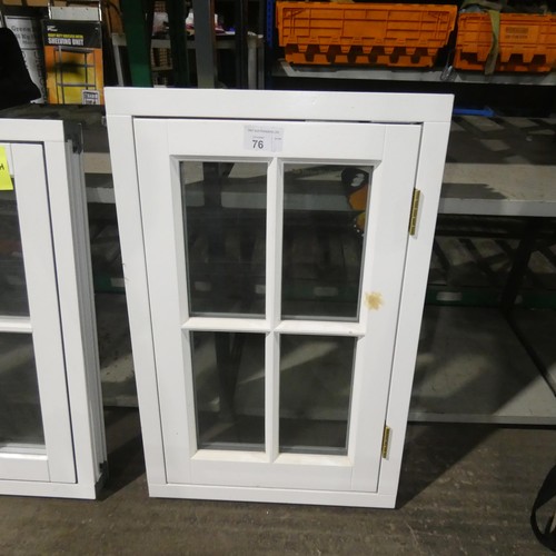 76 - A small engineered hardwood flush double glazed casement window, colour is white on both sides, over... 