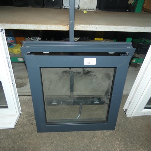 88 - A small aluminium double glazed top hinged window, colour is dark grey both sides, overall size of f... 