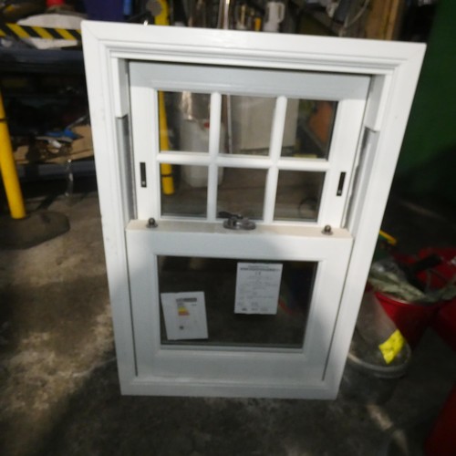 90 - A PVC double glazed sash window, colour is white on both sides, overall size of frame is approx 60cm... 