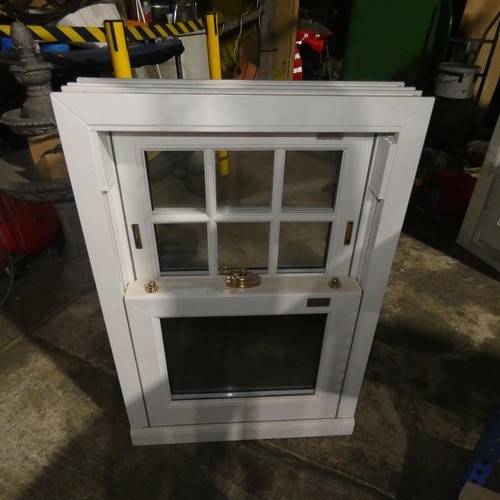 91 - A PVC double glazed sash window, colour is white on both sides, overall size of frame is approx 60cm... 