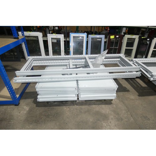 93 - A run of 6 bays (7 uprights) of grey metal bolt less stores type racking comprising 7x uprights at a... 