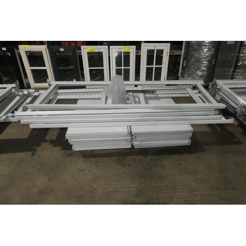 95 - A run of 6 bays (7 uprights) of grey metal bolt less stores type racking comprising 7x uprights at a... 