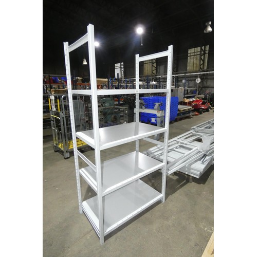 97 - A run of 6 bays (7 uprights) of grey metal bolt less stores type racking comprising 7x uprights at a... 